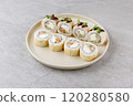 Japanese Sushi Rolls Philadelphia Uramaki Plate on Gray Background for Restaurant Menu or Food Delivery 120280580