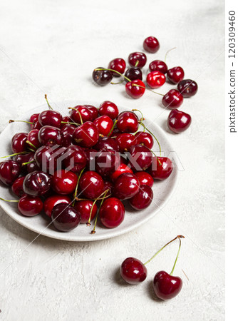 red cherry, cherry berry, scattered on a plate, top view, no people, 120309460