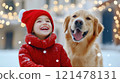 Festive Winter Fun with Child and Golden Retriever 121478131