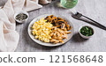 Scrambled eggs, fried chicken and champignons on a plate on the table web banner 121568648