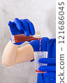 Close-up of a doctor gloves working in a testing laboratory 121686045