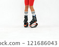 Girl in a New Year's hat and Stylish kangoo shoes 121686043