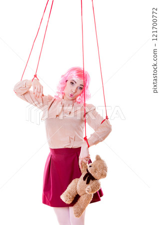 woman girl stylized like marionette puppet on string 121700772