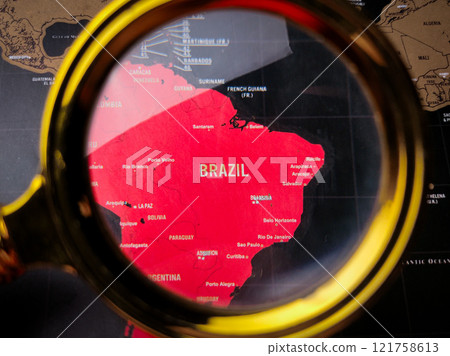 Closeup magnifying glass and focus to BRAZIL map. 121758613