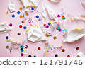 Deflated balloons and colourful confetti scattered on pink. 121791746