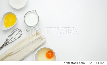 Baking Crinkle Cake, near baking dish with ingredients, phyllo dough, egg, butter, nuts, milk 121844464