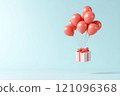 Gift box tied to floating balloons 121096368