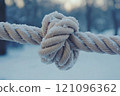 Rope tied in a tight knot. Strength connection concept 121096362