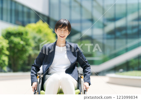 Wheelchair user in a suit 121099834