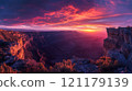 A beautiful sunset over a canyon with a mountain in the background 121179139