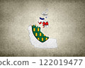 Map of the Northwest Territories with its flag on a paper 122019477