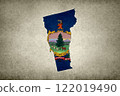 Map of the state of Vermont with its flag on a paper 122019490