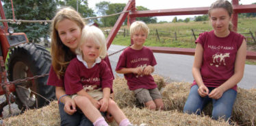 kids in hay wagon