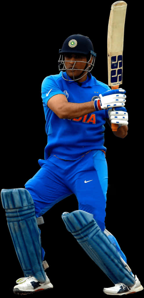 A Man In Blue Uniform Holding A Bat