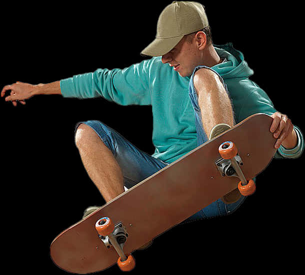 A Man In A Hat And Sweatshirt Holding A Skateboard