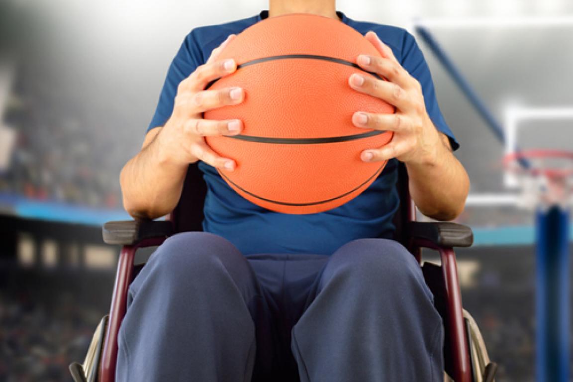 Man in Wheelchair with basketball