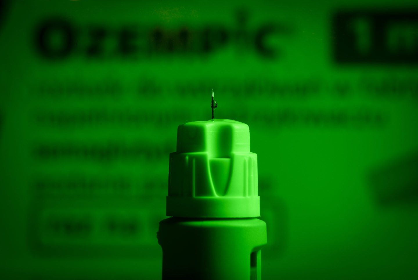 Close-up of an Ozempic pen in a greenwash style