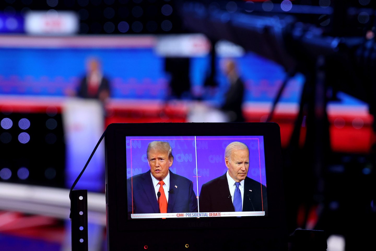 Split screen of Trump and Biden on a monitor at the recent debate