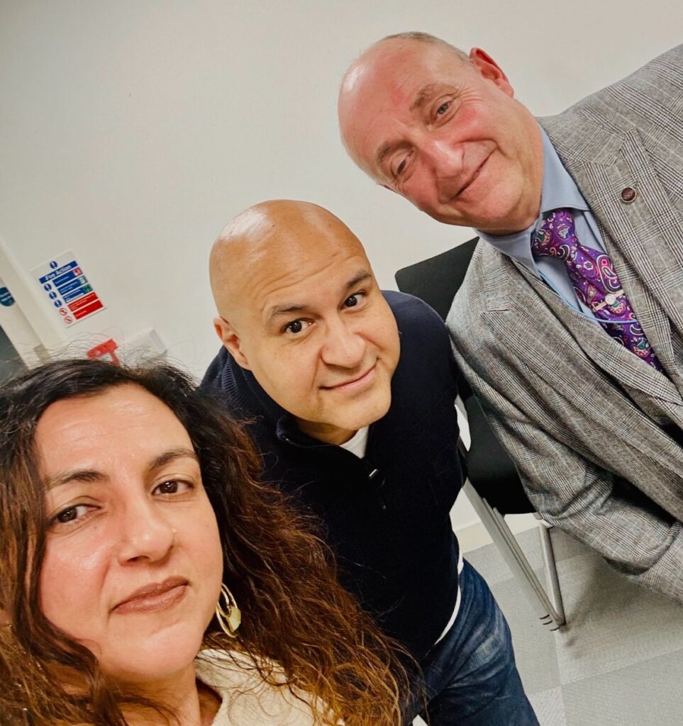 Monica Shafaq, Frankie Graham, and Ian Semel posing at the NGSN East of England Regional Board meeting.