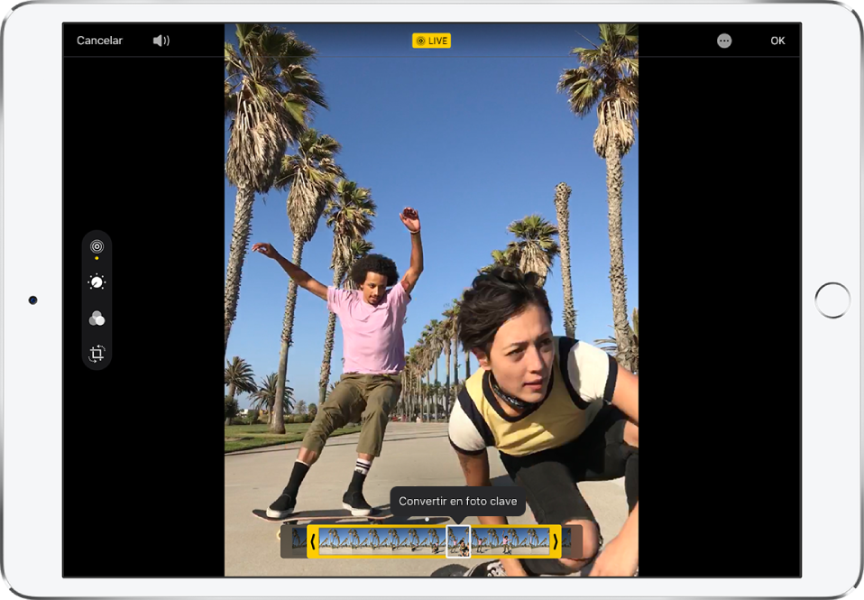Live Photo en modo de edición. En la parte izquierda de la pantalla, el botón Live está seleccionado. La foto se muestra en mitad de la pantalla y los fotogramas de Live Photo se muestran debajo. El fotograma clave seleccionado tiene un contorno blanco y la opción “Convertir en foto clave” aparece encima del fotograma.