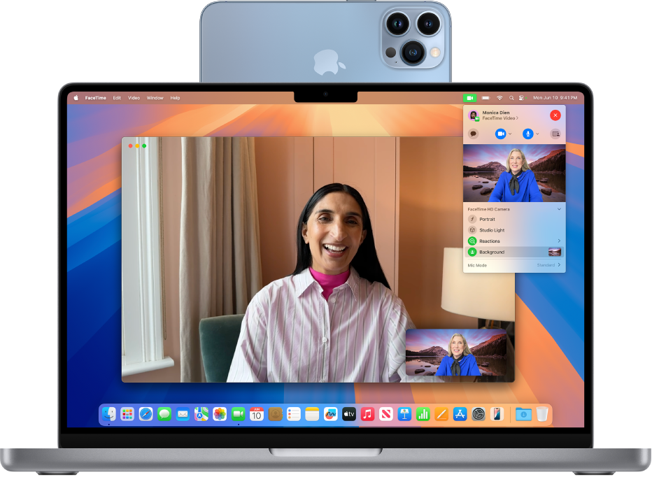 Un MacBook Pro utilisant un iPhone comme webcam et affichant un appel FaceTime.