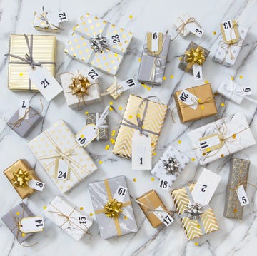 gold and silver wrapped advent gift boxes