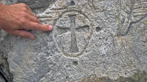 What appears to be a Templar cross carved into a rock