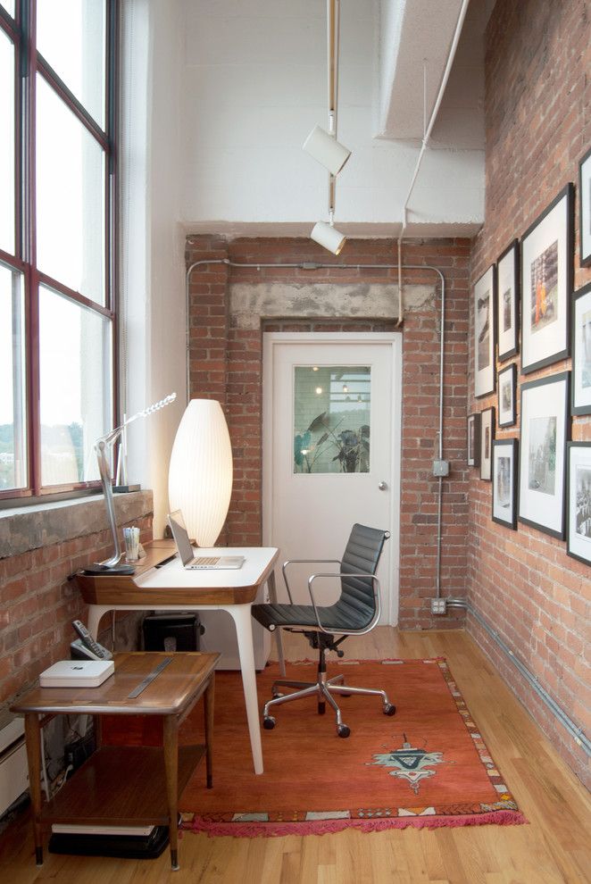 A brick wall is a perfect idea for a loft-style home office.