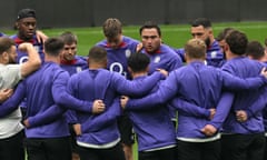 England's Jamie George (centre) speaks with his teammates during the captain's run at the Allianz Stadium.