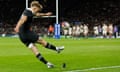 Damian McKenzie of New Zealand kicks the winning conversion.