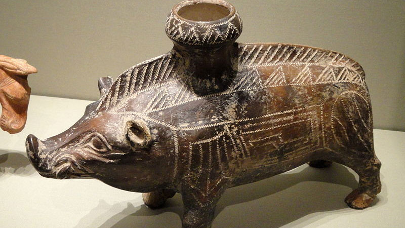 ceramic sculpture of a boar