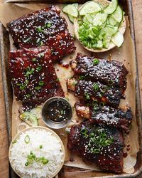 This Sticky Asian Ribs recipe is baked low & slow in the oven and finished with a sweet & sticky glaze. The ribs are so tender that they basically melt in your mouth. Be sure to serve them with extra sauce!