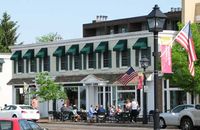 The Caribou in Wayzata, MN overlooks Lake Minnetonka and neighbors a cozy bookshop.