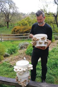 Growing Mushrooms in Buckets, Logs & Gardens [Free Guide] - Milkwood