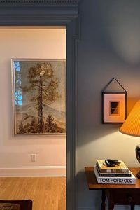 Oversized tree art print, coffee table books, link decorative object, tapered lamp shade