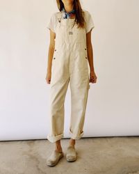 Our newest overall fit in a 100% cotton natural canvas, enzyme rinsed for a really nice hand. We've patterned these after a vintage pair of overalls from my own personal collection. Lots of little details including green accent stitch, carpenter loop + pocket, triple needle stitch seams. They are designed oversized. You can size down for a more fitted look if you prefer. 00 / XXS (jean size 24-25) | 0 / XS (jean size 26-27) | 1 / S (Jean size 28-29) | 2 / M (jean size 30-31) | 3 / L (Jeans 31-32