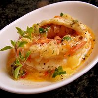 Oven baked butter-poached lobster. Lobster meat baked in oven and served with homemade butter sauce.Delicious!