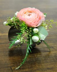 Corsage cuff with ranunculus designed by Hafner Florist, Sylvania, Ohio