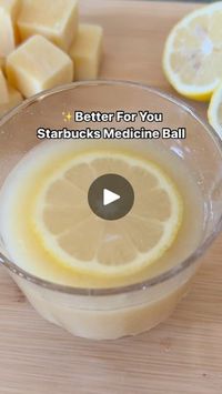 24K reactions · 5.2K shares | STARBUCKS MEDICINE BALL ✨ 🍋 🫚 

Comment RECIPE to have it sent directly to your inbox 🤍

Did you know that the Starbucks Medicine Ball has over 30 grams of refined sugar? Let’s make a better version of this at home for a fraction of the price. 

✨4-5 lemons
✨3 inch piece of ginger
✨1/3 cup raw honey
✨1 cup cup coconut water
✨mint tea

Blend together all the ingredients (except tea) until smooth. Place in an ice cube tray and freeze overnight. 

To assemble, warm a bag of tea in hot water. Add 1-2 cubes with some raw honey and a slice of lemon. Enjoy!

✨Follow @emilyxlevi for more healthy, simple and family-friendly recipes and tips

Thanks @kalejunkie for the recipe inspo 

#starbucks #starbucksmedicineball #medicineball #immunesupport #naturalremedies #hea