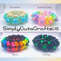 Unique one-of-a-kind themed small 3D (or ufo) kandi cuffs.  Made with high quality elastic string, vivid pony beads, and some shaped beads.  Only one of each available so grab your favorite now!   These cuffs are a perfect addition to your kandi collection and makes a unique gift! ⭐SHIPPING NOTICE⭐ Domestic Shipping only! Shipping is $3.85. PLEASE be sure to provide your correct mailing address - We cannot be held responsible for missing packages delivered to the wrong address. Please note that shipping may be delayed due to conditions outside of our control. Please feel free to message us with any questions. Thank you for your support! ❤️