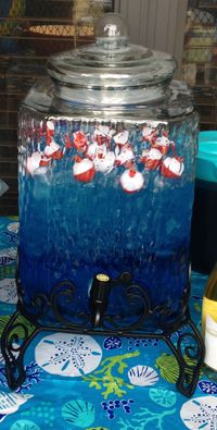 This was delicious, I made this for a nautical baby shower.. Coconut rum, blue curaçao, and sprite. :). If dale ever gets married....we should do this for a couples shower for outdoor gifts.... Minus the alcohol....blue kool aid punch.....