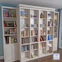 How great is it to have the convenience of a Murphy Wall bed with the storage of bookcases all in one fabulous piece of furniture? The bookcases rotate out to make way for the bed to be lowered.