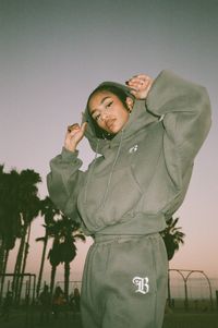 Sooo much love went in to making this sweatsuit, we had to drop a lil heart on our B logo just to show you! Buy this hoodie separate or get the whole fit by pairing with our B Love Sweats We custom made these with a more oversized look, so we recommend sizing down if you prefer your sweatsuits a lil more fitted. Oversized 90's bubble fit Poly cotton fleece blend Model is 5'0" and wearing a size medium