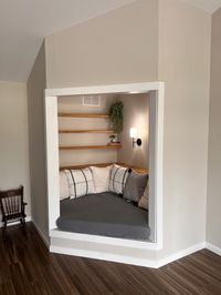 Hubby built the perfect reading nook in our large living room! Its our favorite place to be as a family!