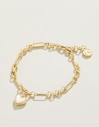 Capture that warm feeling of a full heart in this charming Full Heart Bracelet. A thick piece of shimmering mother-of-pearl is set in a lustrous 18kt matte gold plated setting on a detailed chain. Timeless and lovely. Women's Full Heart Bracelet Mother-of-Pearl by Spartina 449