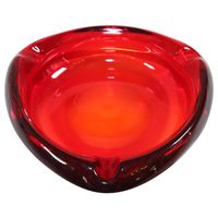 Vintage modernist mid-century glass ashtray ruby red triangular. Mid-century glass ashtray circa 1960's - 1970's USA. Large and stunningly beautiful art glass ashtray by Viking in their beautiful ruby red color. Back when people still smoked everywhere, the American glass manufactures were churning out ashtrays as fast as they could make them. Viking glass company was no exception, and they made some wonderfully beautiful "Smoker's items" as they were called in their catalogs. This ashtray was i