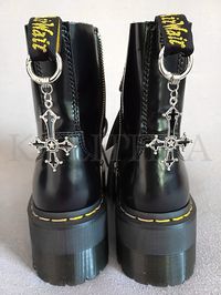 How amazing are these gothic shoe charms? - Durable rings that easily open and close, allowing for effortless attachment to any footwear.  - Perfect for adding flair to old boots or spicing up new shoes.  -Style rhem with goth dresses, grunge, punk, or metal outfits. -Perfect for both old and new shoes. Be bold and add a unique touch to any pair of footwear. Price is for a pair of charms.