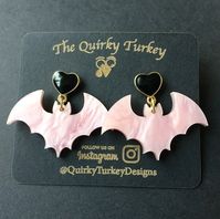 These dark, yet delicate bat earrings are the perfect spooky outfit addition for all who love bats.  *sterling silver posts are very soft and may be bendable  1.5in wide 1.25in long