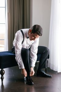 Groom Getting Ready Photo | Miami Wedding Photographer |The day kicked off at the luxurious Hotel Colonnade in Coral Gables, where both Jadyna and Max were getting ready. Find wedding getting ready photos bride, wedding getting ready photos groom, and getting ready for wedding photo ideas. Book Erika today for your florida wedding at erikatuestaphotography.com