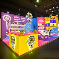 The @brainblasterz booth at ISM was a total showstopper! 🍬 They were lighting up the place with their awesome display. Their giant logo made them impossible to miss, and the bright colors definitely grabbed everyone's attention.